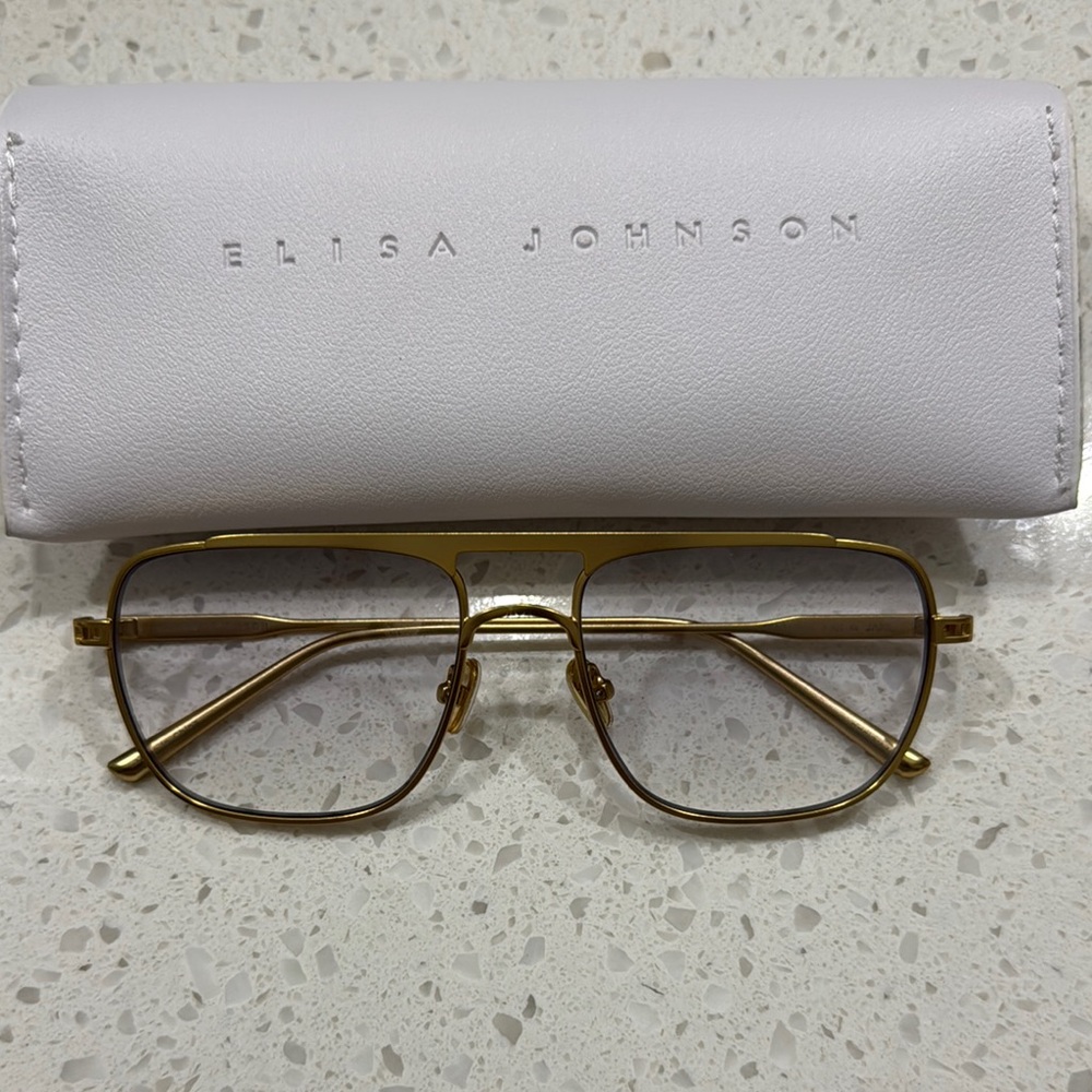Elisa Johnson Jane in Gold Metal.